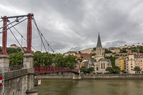 Church of Saint Georges and footbridge, Lyon, France. horizontal view of Lyon and Saone River in France.