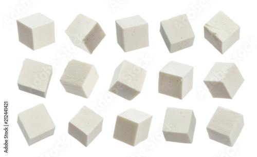 Greek feta cubes. Diced soft cheese isolated on white background