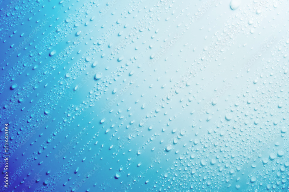 Water droplets on blue background.