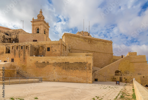 Victoria, the island of Gozo, Malta. Buildings inside the Citadel and the bell tower of the Cathedral