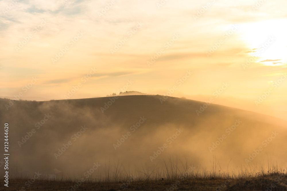 Morning fog on the hill