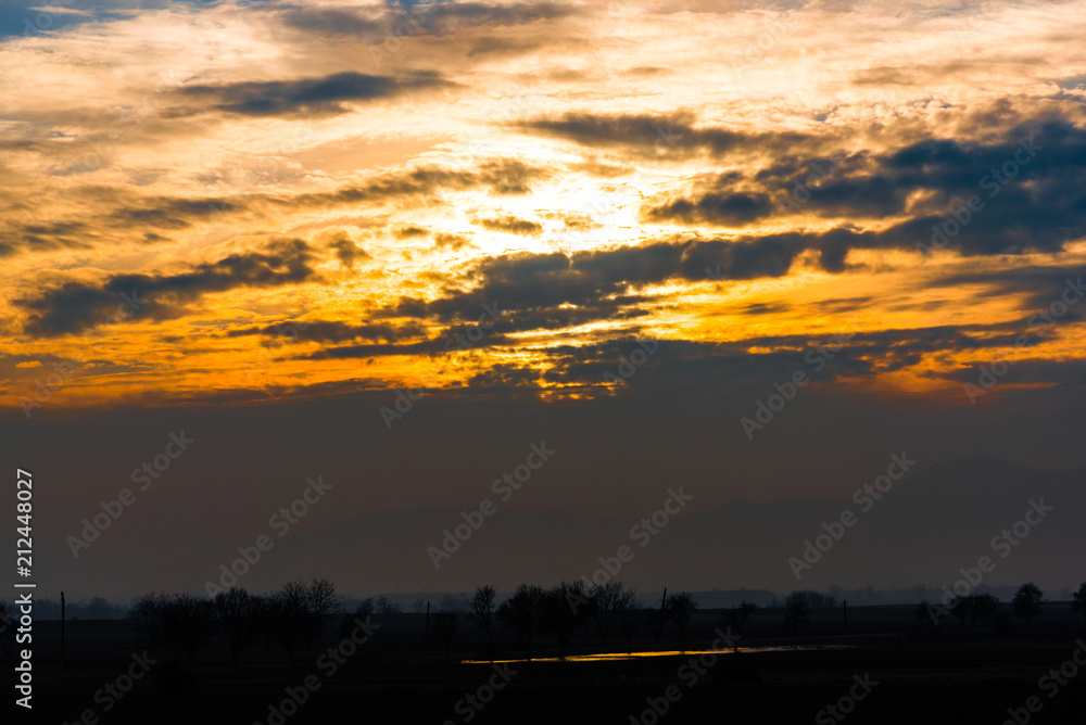 Naklejka premium Clouds at the sunset