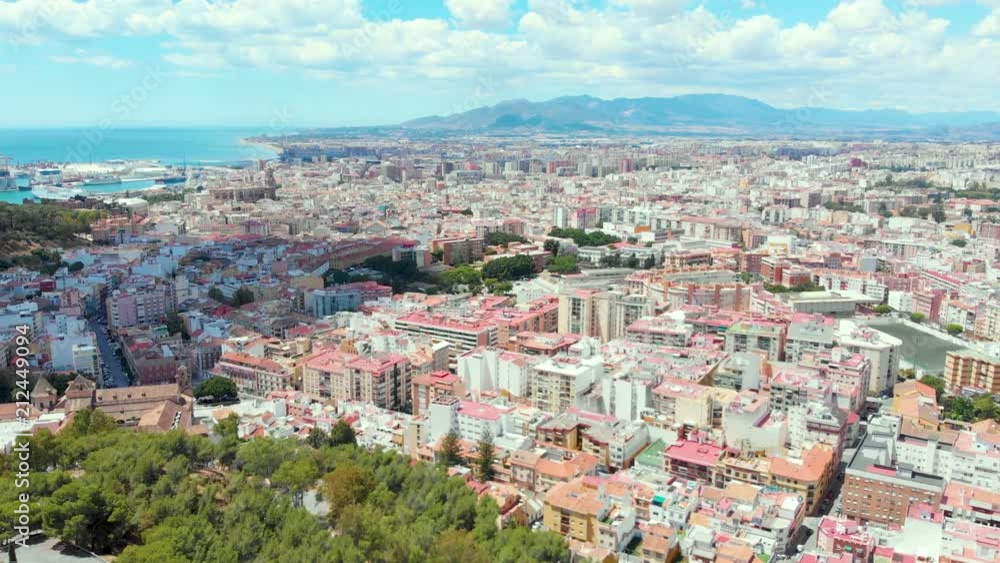Aerial view of Malaga (Costa del sol) with the sea and mountains surrounding it Aerial view of Malaga (Costa del sol) with the sea and mountains surrounding it