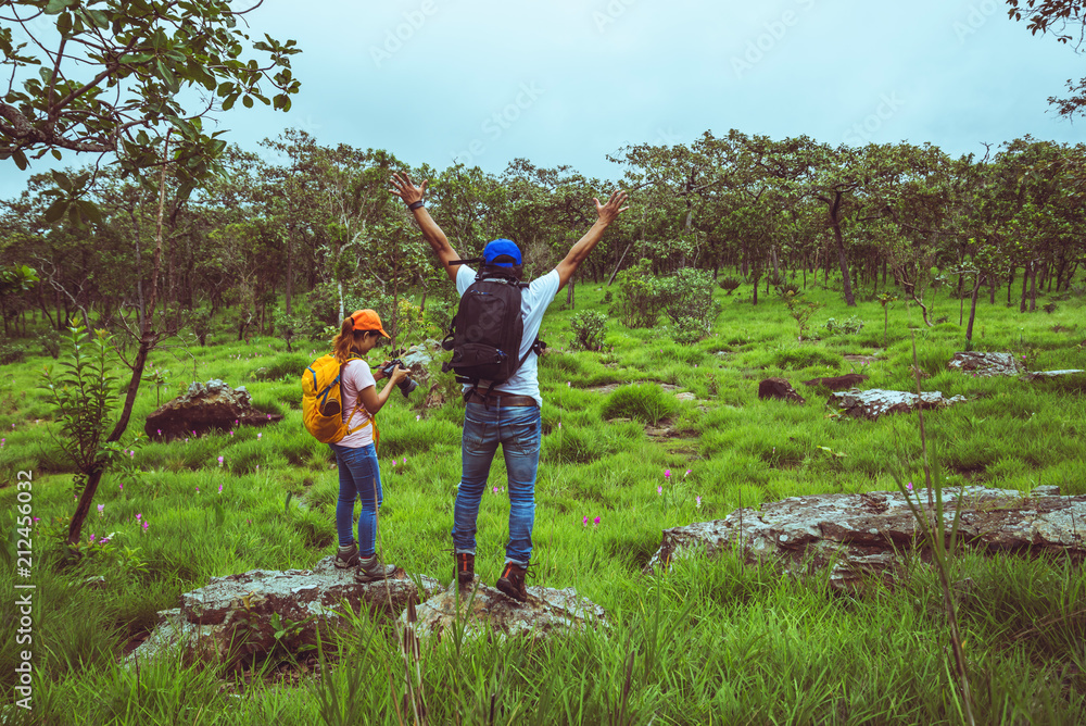 Lover woman and men Asian travel nature. Travel relax. Photography Cucumber sessilis flower field. Lover woman and men Asian travel nature. Travel relax. Photography Cucumber sessilis flower field.