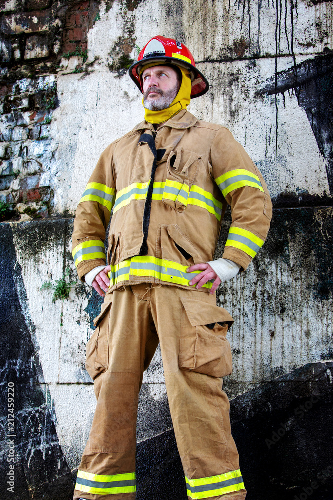 portrait of handsome fireman in uniform