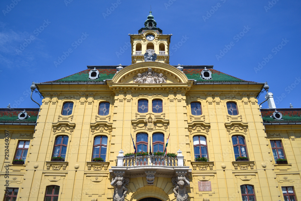 The City Hall of Szeged, Hungary. Ornate facade, tower, and ceramic tiles on the roof