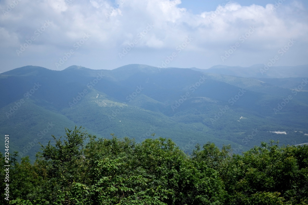 Cumulus clouds above the mountains