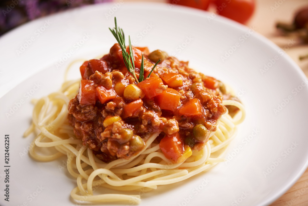 A dish of delicious spaghetti on the table A dish of delicious spaghetti on the table