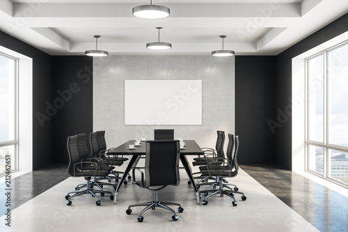 blank poster in concrete boardroom