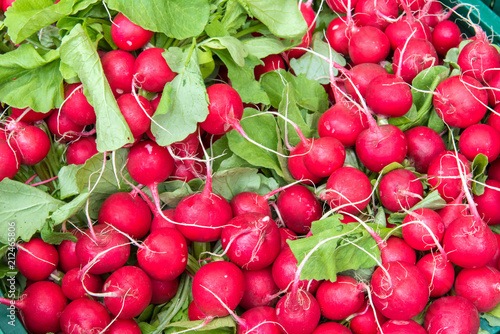 Pile of red radish for sale at a market 