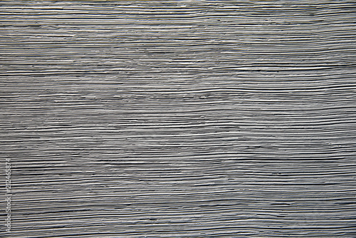 Obraz na plátně Rough gray background with a horizontal texture