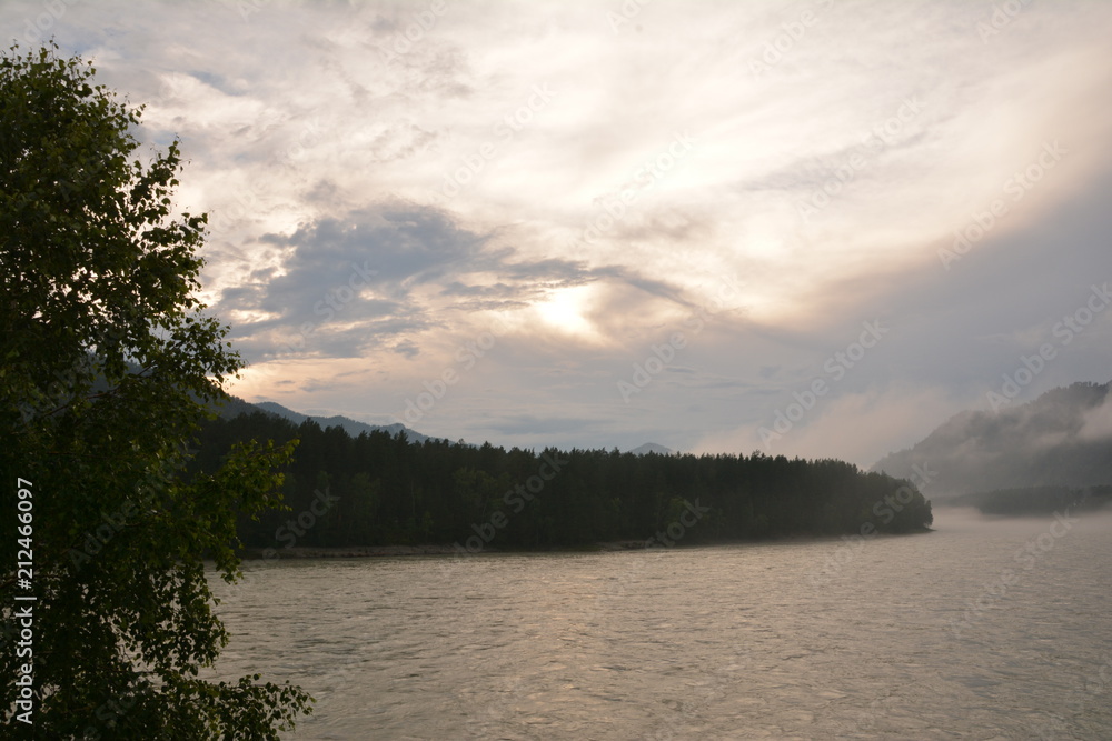 Fototapeta premium nature landscape landscape mountains field grass river water clouds clouds sky trees birch green blue white fresh air oxygen beauty latitude summer season flowers butterfly blo