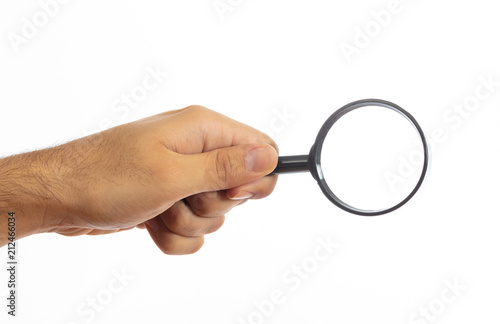 Search concept. Magnifying glass on a hand palm isolated on white background, clipping path