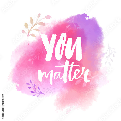 You matter. Inspirational saying on pink watercolor paint stain. Brush calligraphy for cards, posters and apparel design