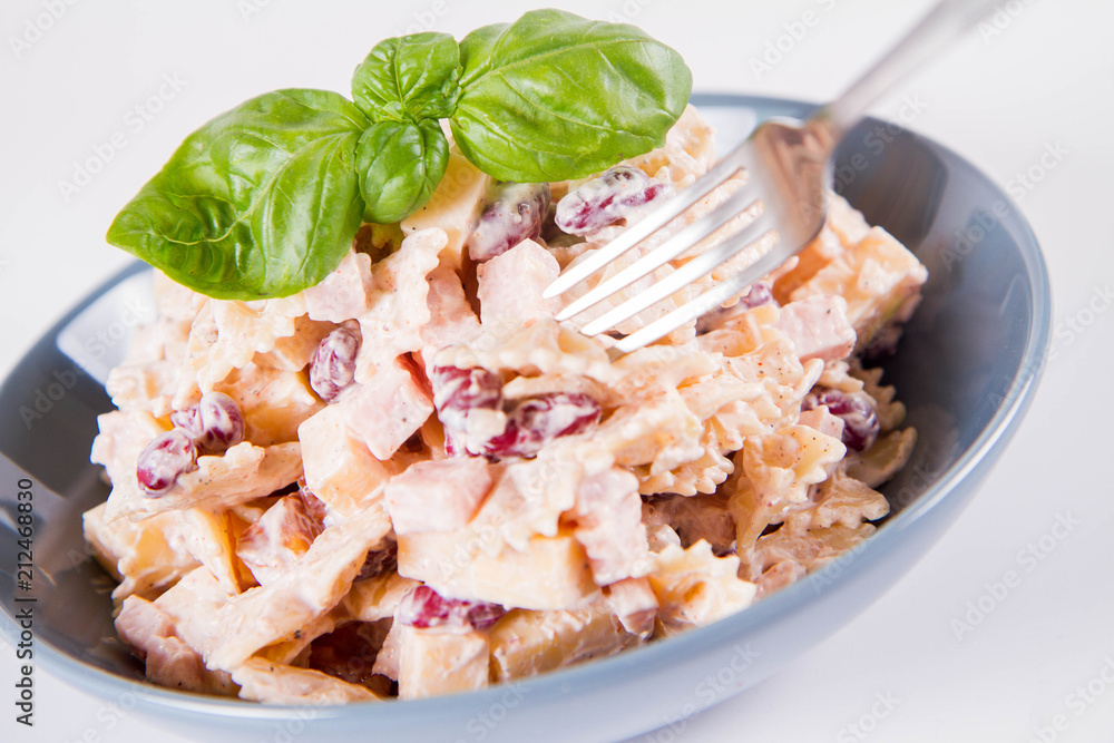 Pasta salad with cheese, ham, kidney beans and mayonnaise Pasta salad with cheese, ham, kidney beans and mayonnaise