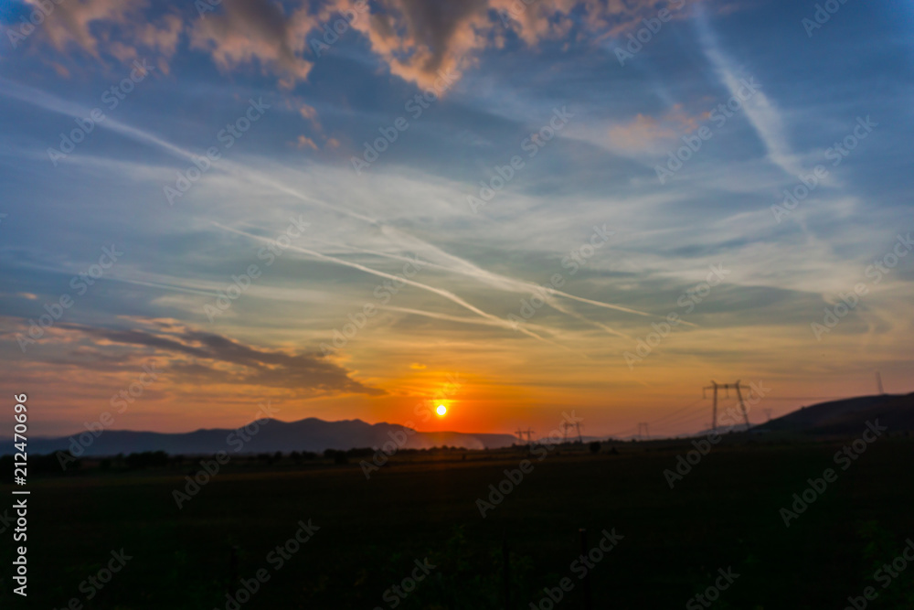 Obraz premium Clouds at the sunset