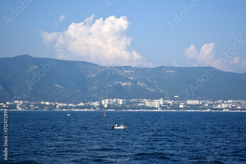 Gelendzhik, Russia - June 27, 2018: The view of the town and Markotkh ridge from the sea