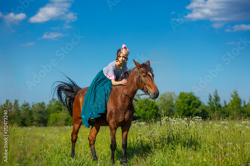 beautiful aristocrat in a dress on a horse © Екатерина Переславце