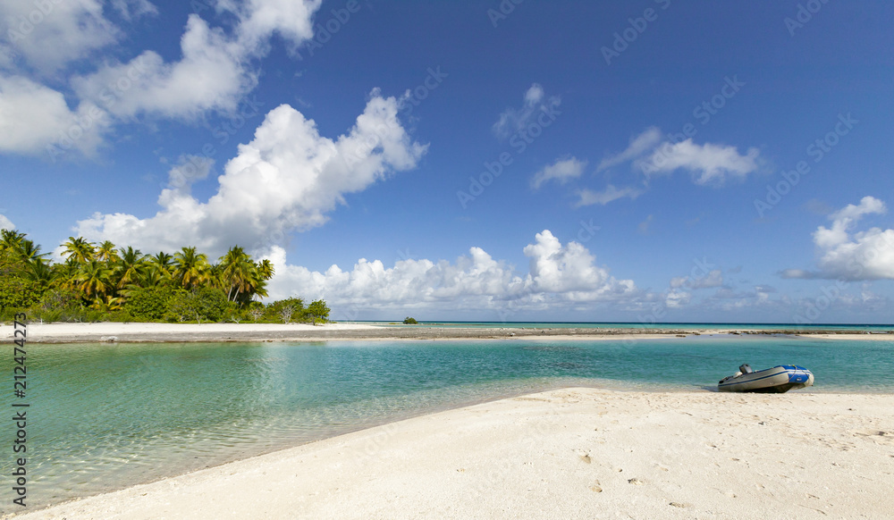 reef ring, lagoon and motu with palm trees on Makemo Atoll, Tuamotus archipelago, French Polynesia, France,