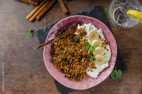 Granola baked in oven with nuts