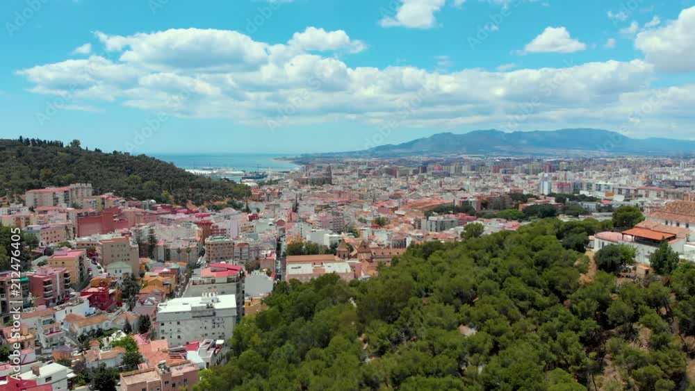 Aerial view of Malaga (Costa del sol) with the sea and mountains surrounding it Aerial view of Malaga (Costa del sol) with the sea and mountains surrounding it
