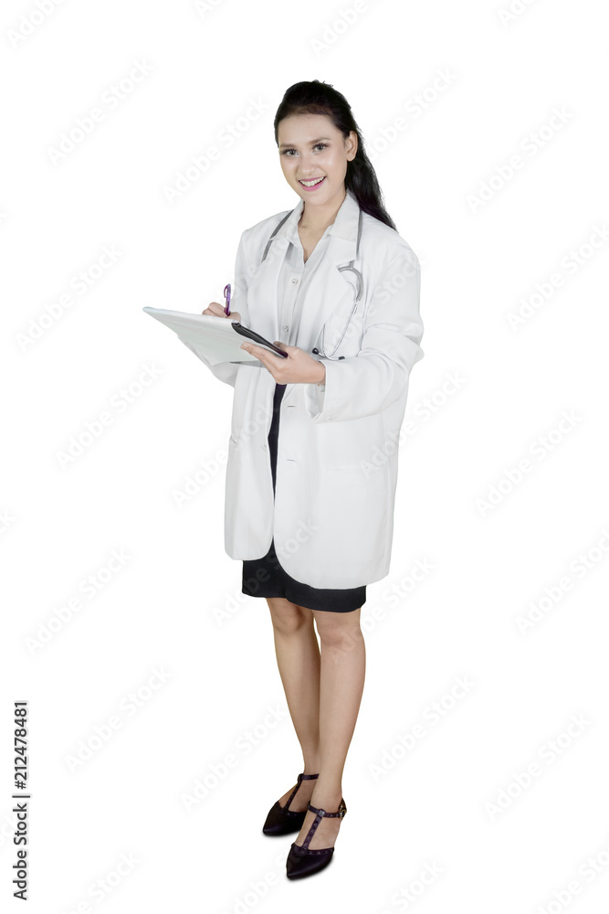 Caucasian doctor is writing on the clipboard Caucasian doctor is writing on the clipboard