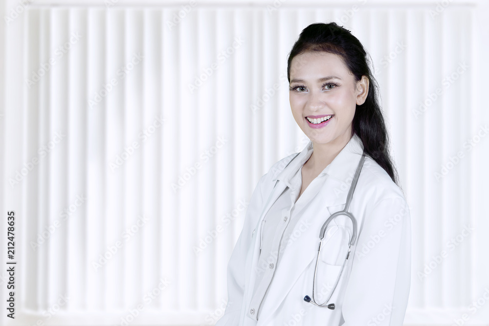 Caucasian female doctor standing in the clinic Caucasian female doctor standing in the clinic