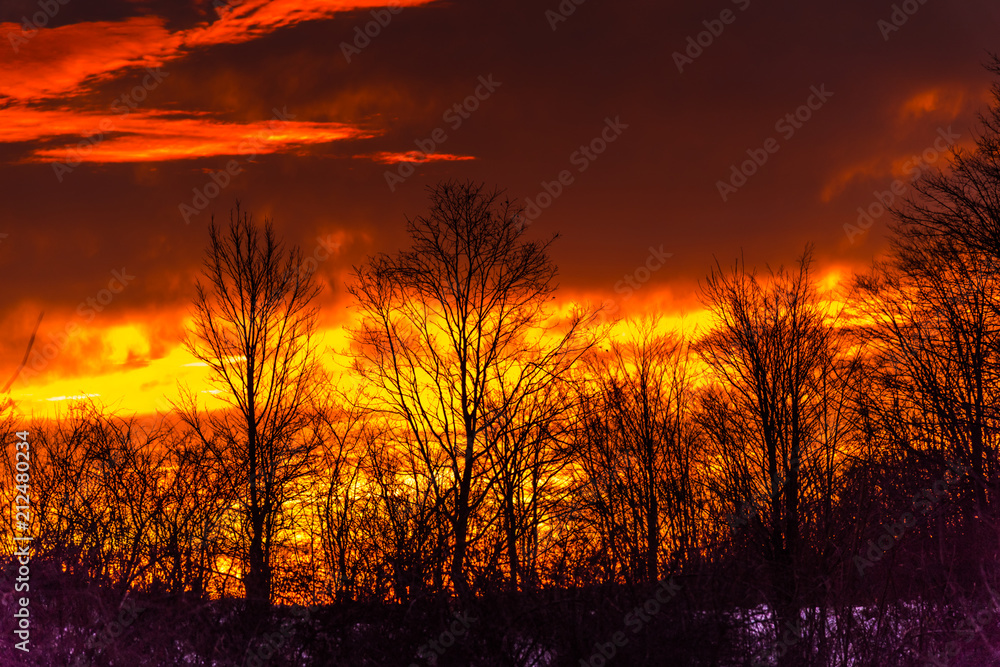 Fototapeta premium Winter red sunrise in the mountains