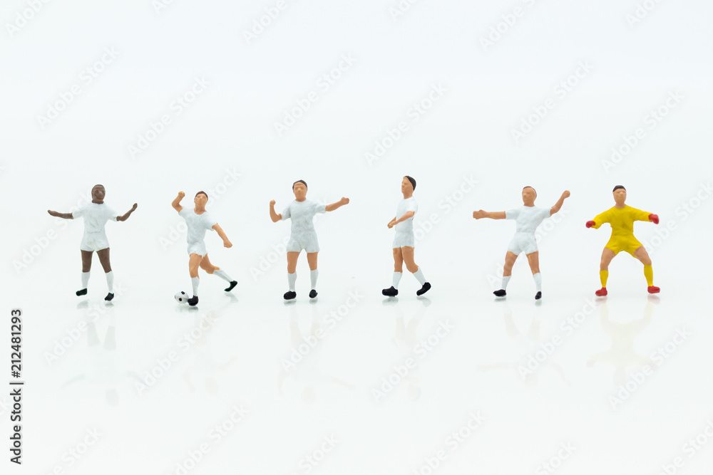 Miniature people : Football team image use for football of the year, world cup , sport concept. Miniature people : Football team image use for football of the year, world cup , sport concept.
