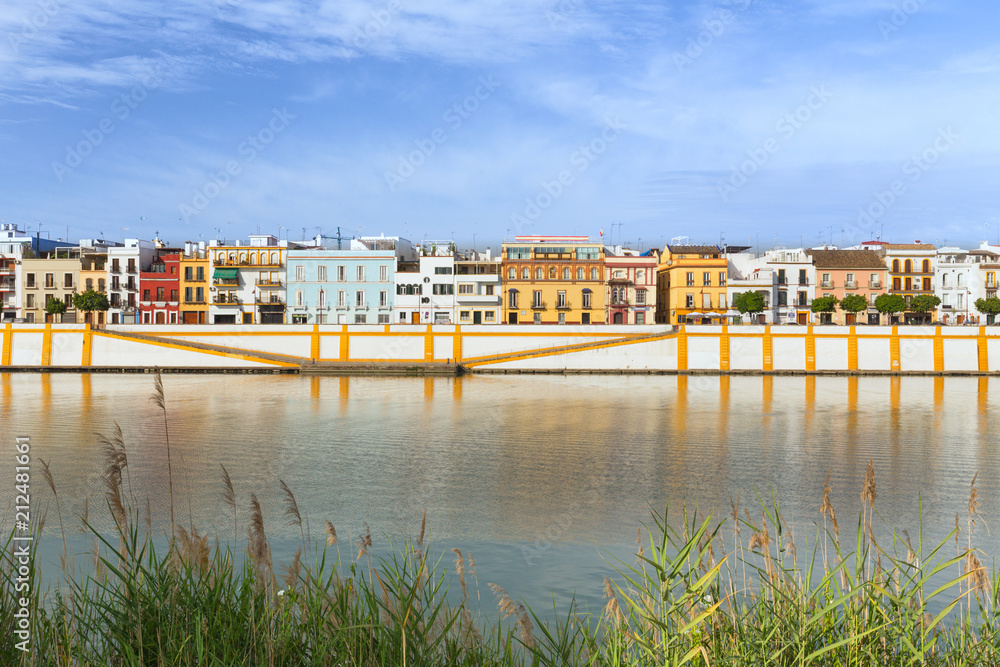 Seville, Spain,  Waterfront view to the historic architecture of the Triana district