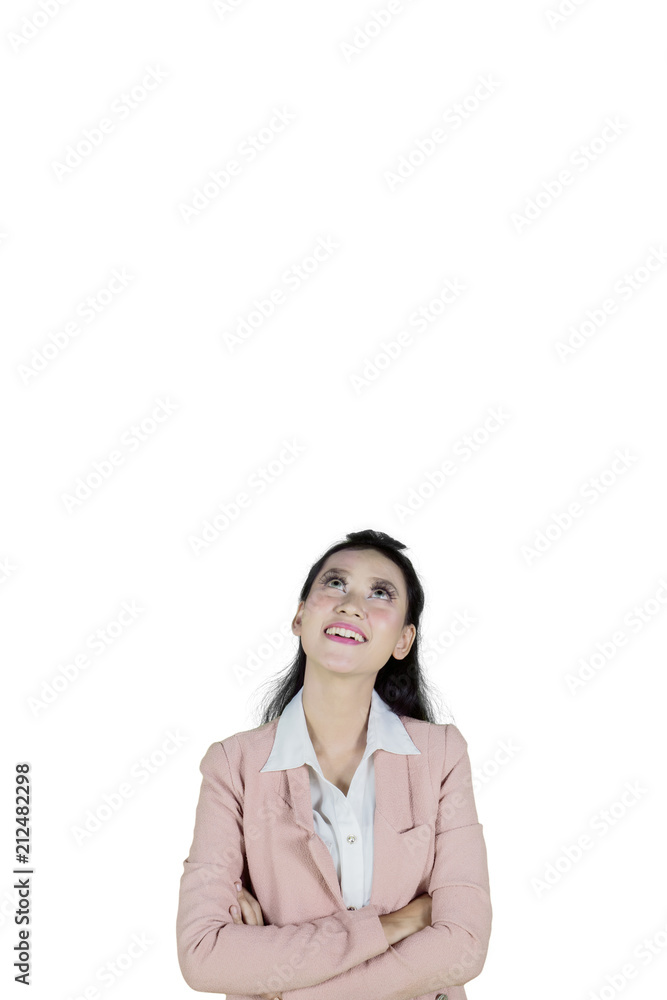 Happy businesswoman thinking an idea on studio Happy businesswoman thinking an idea on studio