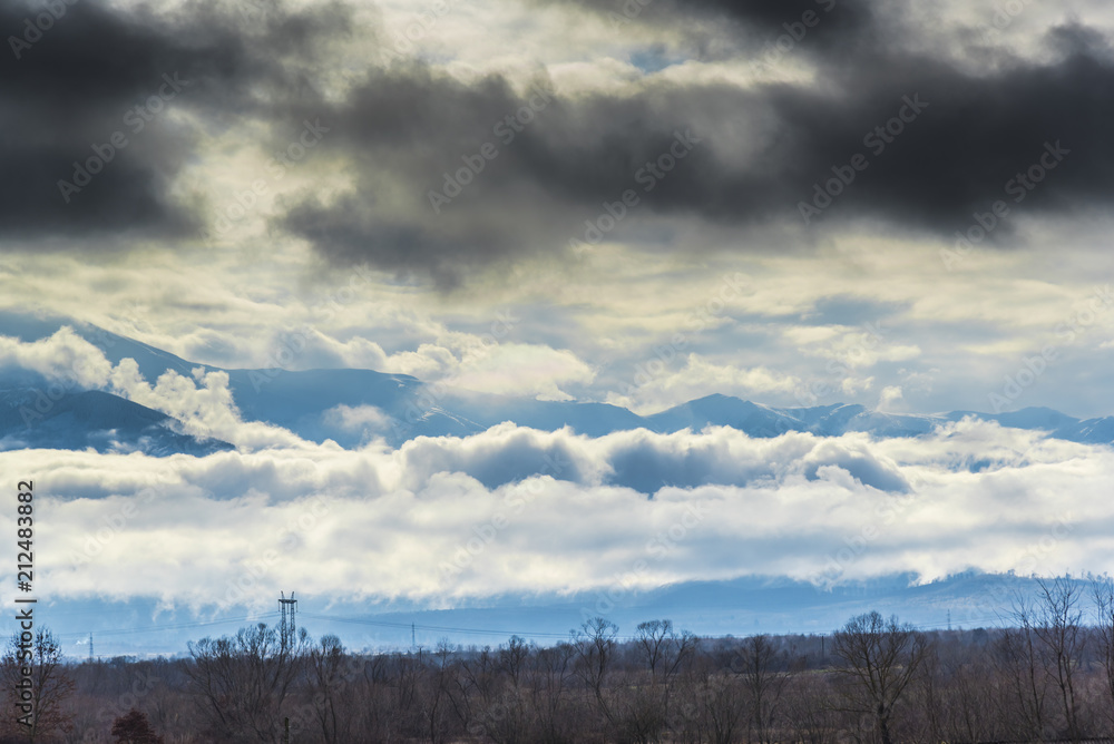 Dramatic clouds on the sky in the wintert Dramatic clouds on the sky in the wintert