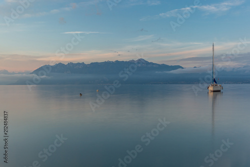 Colorful sunrise on the marina of Lausanne on the Lake Leman in summer with the view of the Swiss Alps in background - 25
