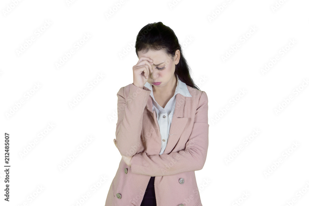Stressful businesswoman standing in the studio Stressful businesswoman standing in the studio