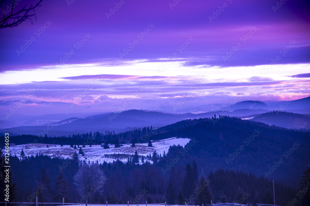 Fototapeta premium Winter clouds at the sunset