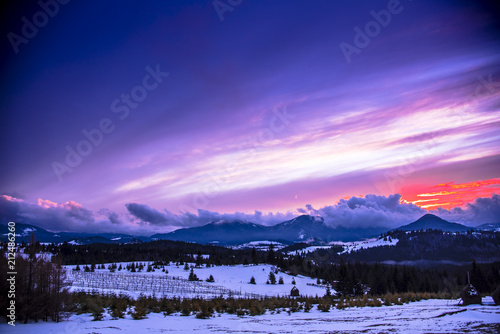 Fantastic clouds in the Mountains at the winter, Pasul Tihuta, Romania photo