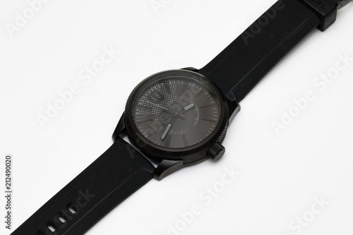 modern mens watch with silicone strap on white background