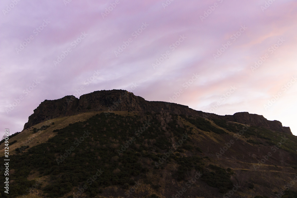 Silhouette of Arthur Seat at dawn