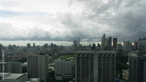 Bangkok, Thailand - Jul 3,2018 : Storm clouds with rain passing over sky of Bangkok cityscape. 4K Timelapse