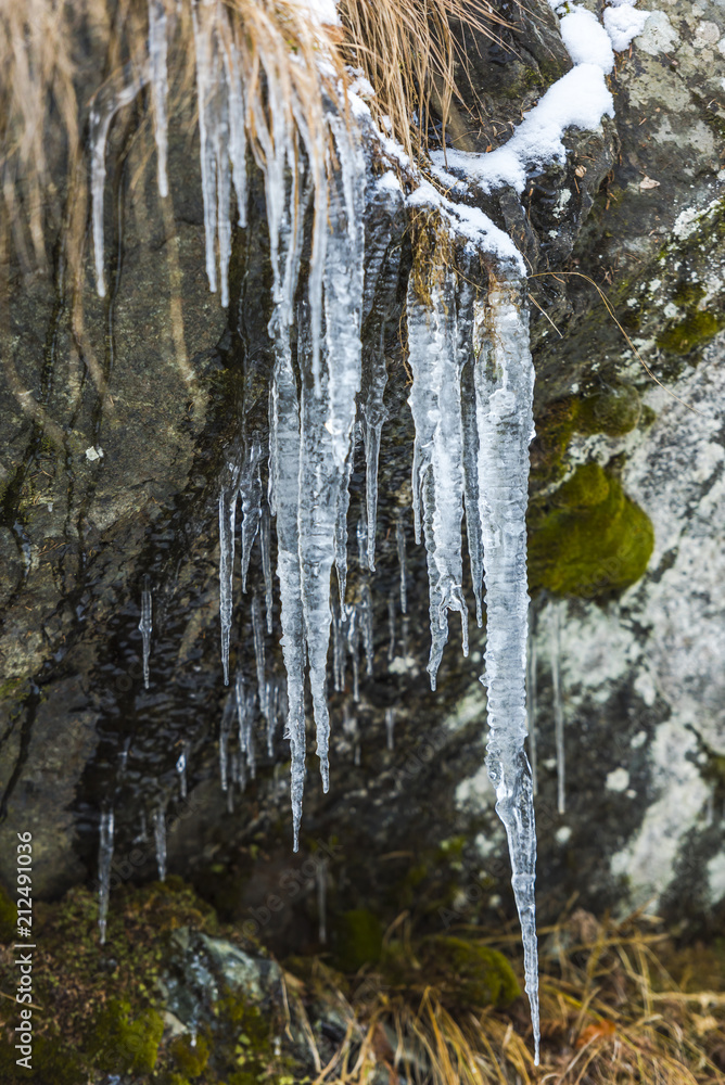 Winter icicles on the rocks Winter icicles on the rocks
