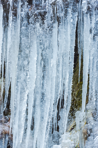 Winter icicles on the rocks