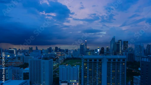 Bangkok, Thailand - Jul 3,2018 : Storm clouds with rain passing over sky of Bangkok cityscape. 4K Timelapse