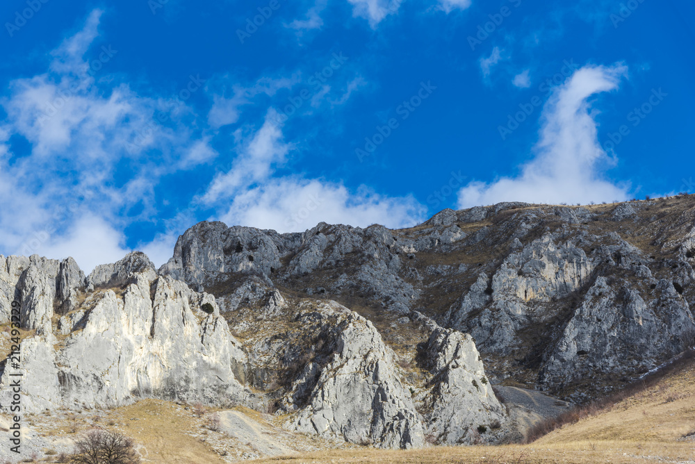 Mountains stone and white clouds Mountains stone and white clouds