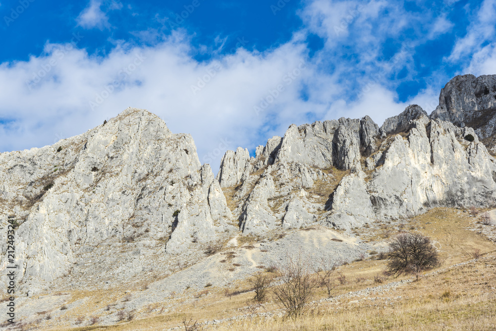 Mountains stone and white clouds