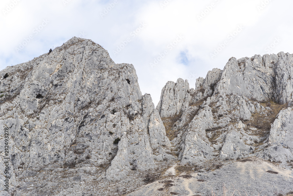 Mountains stone and white clouds Mountains stone and white clouds