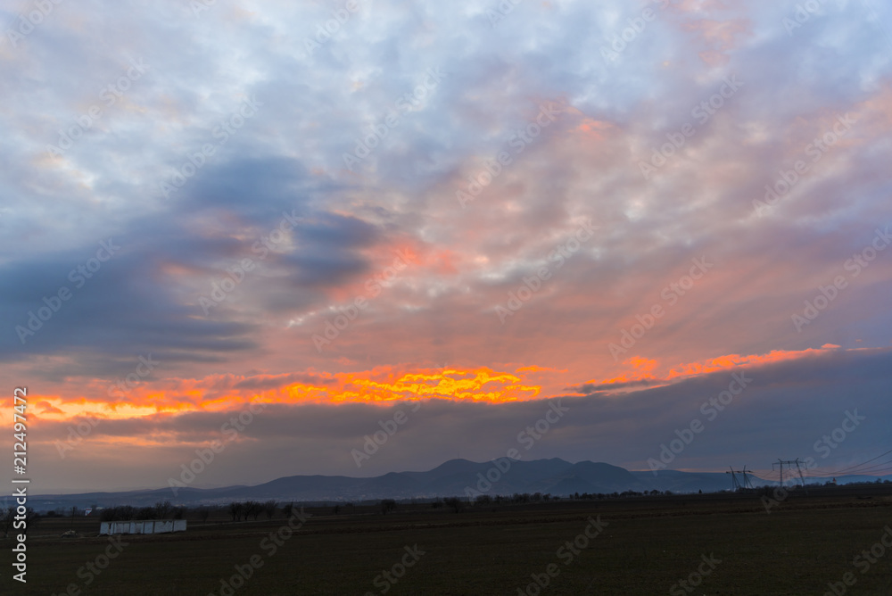 Dramatic clouds at the sunset