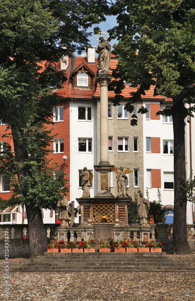 Votive column of Blessed Virgin Mary at Market square in Klodzko. Poland