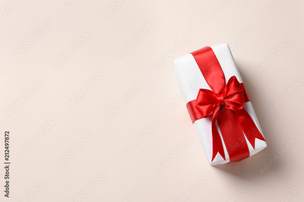 Beautiful gift box on light background, top view Beautiful gift box on light background, top view