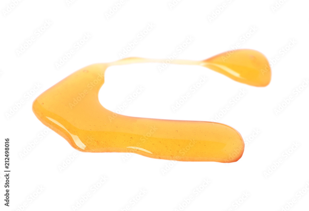 Drops of sweet honey on white background Drops of sweet honey on white background