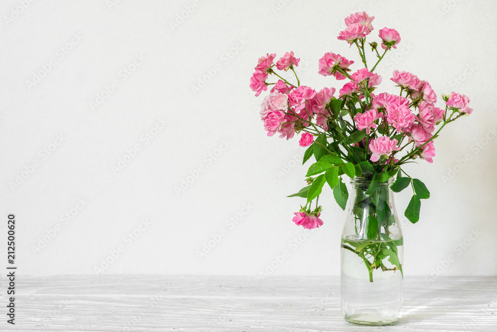 Still life with a beautiful bouquet of pink rose flowers. holiday or wedding background with copy space